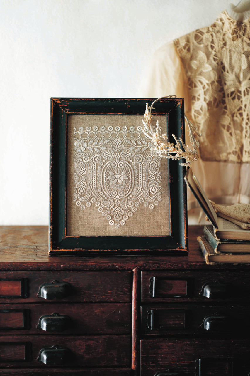 Style antique au point de croix