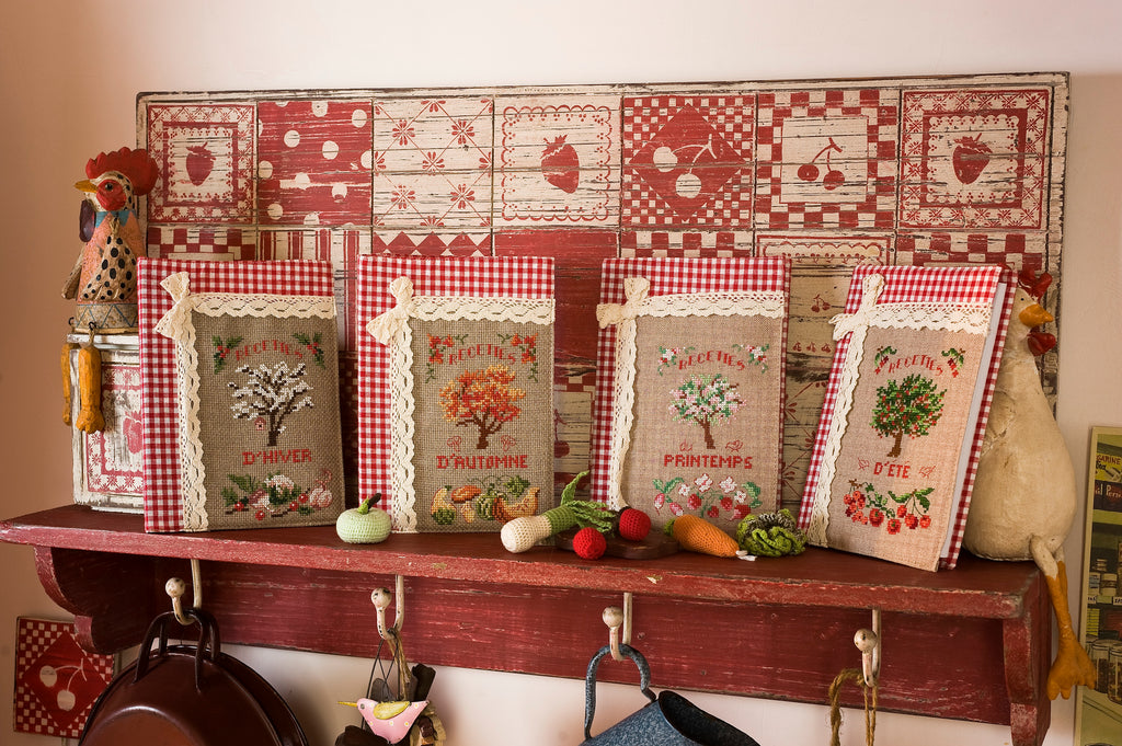 Mook point de croix : les plus belles créations de Véronique Enginger autour de la cuisine — tabliers, maniques, cabas et motifs gourmands pour votre intérieur.