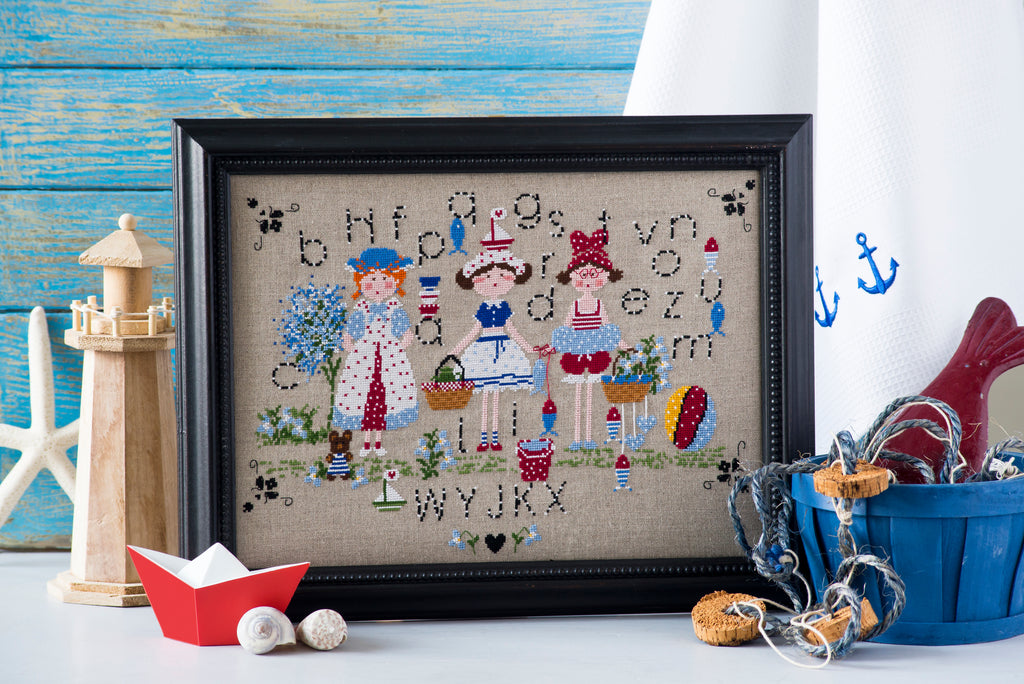 Mook point de croix : une quarantaine de motifs broderie inspirés des quatre saisons — printemps, été, automne et hiver — pour célébrer le charme du temps qui passe.