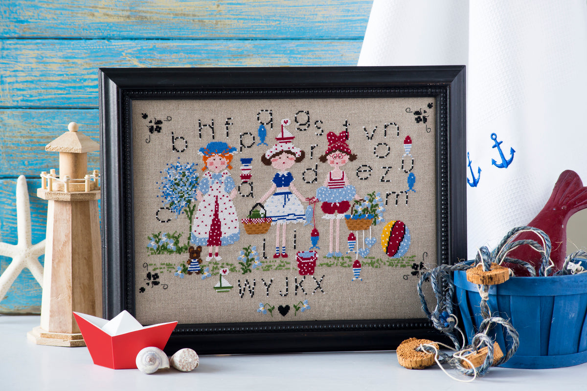 Mook point de croix : une quarantaine de motifs broderie inspirés des quatre saisons — printemps, été, automne et hiver — pour célébrer le charme du temps qui passe.