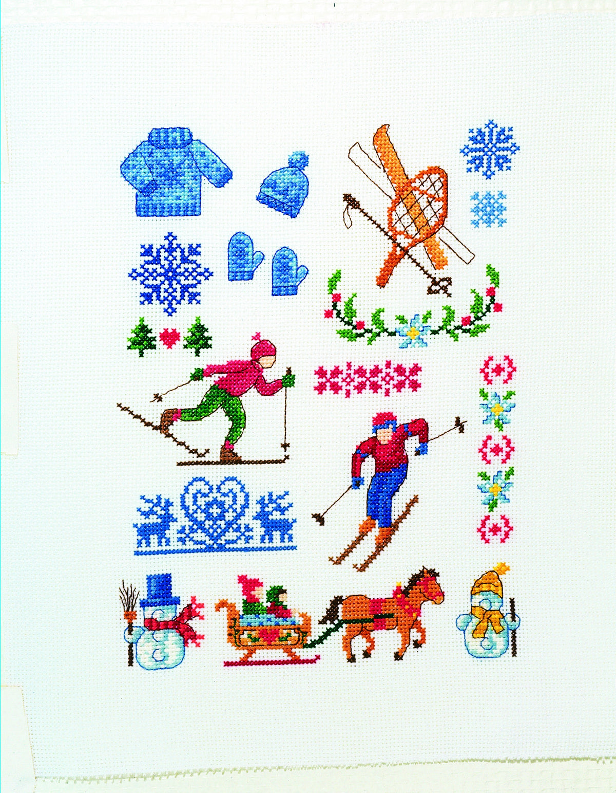 Collector point de croix : 7 grilles montagne par Véronique Enginger — chalet, edelweiss, marmotte et alpages rétro à broder en toute saison.
