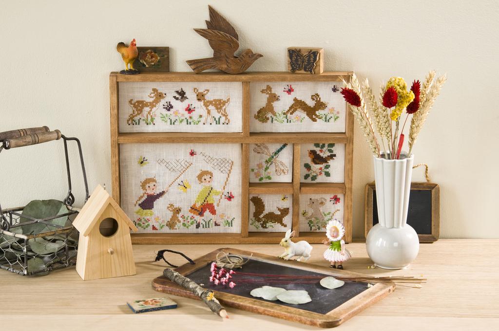 Magazine de broderie N°88 : grilles de point de croix sur le thème du printemps, cuisine, pique-nique, mariage et rangement. Mai/Juin 2021.