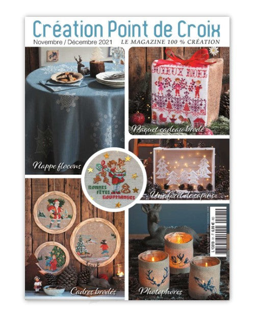 Magazine de broderie N°91 avec plus de vingt grilles de point de croix sur le thème de Noël : décorations, calendrier de l’Avent, nappes et cartes de vœux.