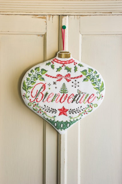 Mook point de croix : 20 créations de Jennifer Lantini autour de l’hiver — nature, maison et Noël — coussins, tableaux et hottes à broder avec douceur.