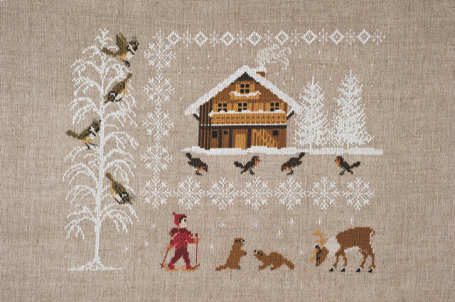 Mook point de croix : 20 créations de Jennifer Lantini autour de l’hiver — nature, maison et Noël — coussins, tableaux et hottes à broder avec douceur.