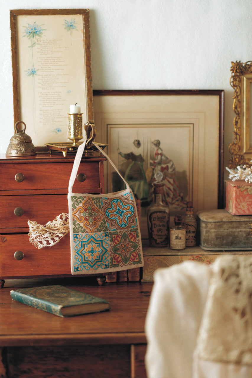 Style antique au point de croix